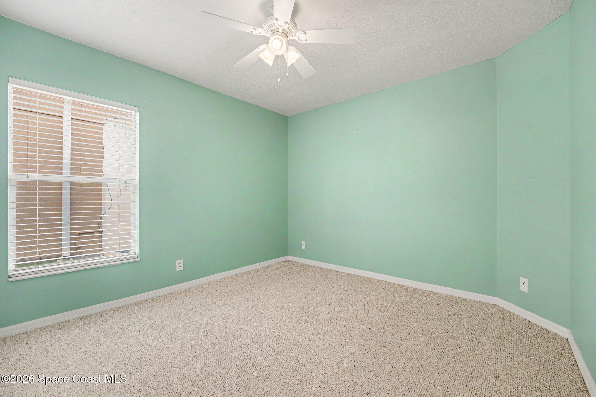 2194 Spring Creek Circle Palm Bay, FL 32905 - Photo 18 of 40 Back Guest Bedroom