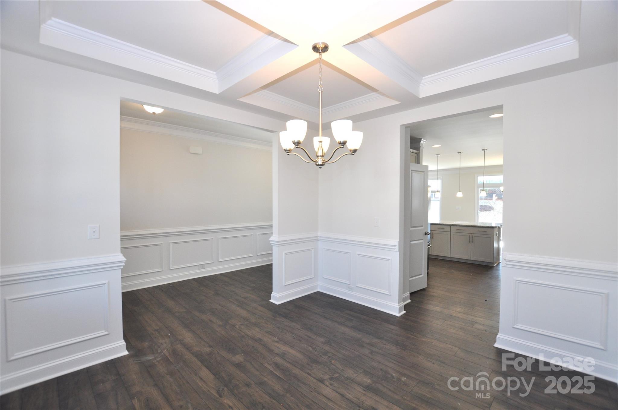 8007 Oakmere Road Waxhaw, NC 28173 - Photo 5 of 28 wooden floor in an empty room with a window