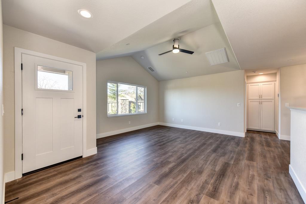 2667 Commons Place Auburn, CA 95603 - Photo 11 of 30 wooden floor in an empty room with a window