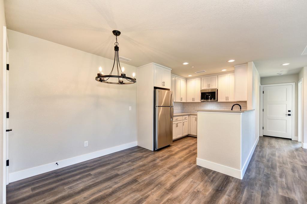 2667 Commons Place Auburn, CA 95603 - Photo 11 of 28 Owned Solar, LVP Flooring, Recessed Lighting, and Ceiling Fans!