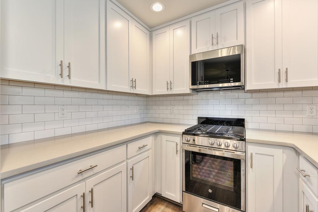 2667 Commons Place Auburn, CA 95603 - Photo 14 of 28 Stainless Steel Appliances Included! Soft Close Drawers/Cabinets. Stone Slab Countertops!