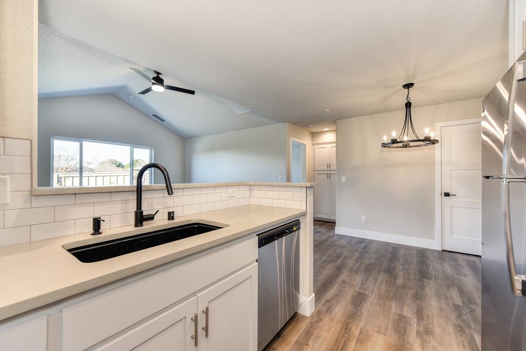 2667 Commons Place Auburn, CA 95603 - Photo 15 of 28 Stainless Steel Appliances Included! Soft Close Drawers/Cabinets. Stone Slab Countertops!