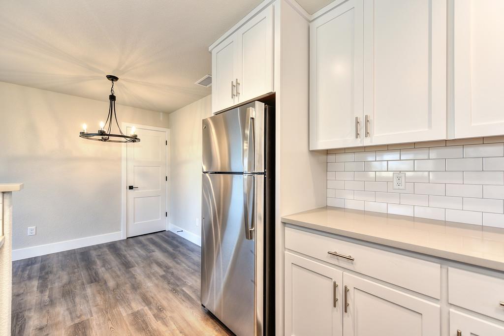 2667 Commons Place Auburn, CA 95603 - Photo 16 of 28 Stainless Steel Appliances Included! Soft Close Drawers/Cabinets. Stone Slab Countertops!