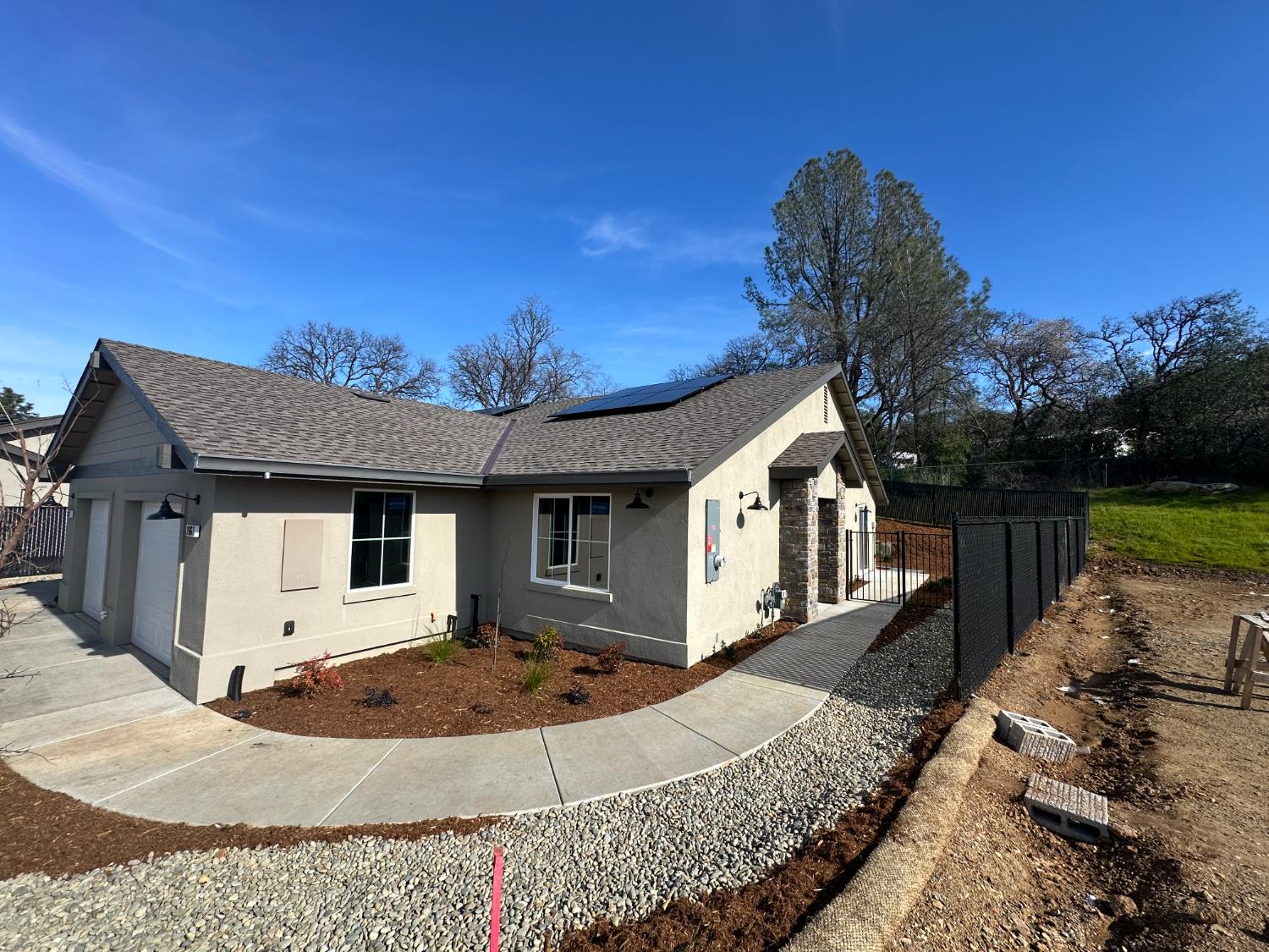 2667 Commons Place Auburn, CA 95603 - Photo 2 of 30 a front view of a house with a yard