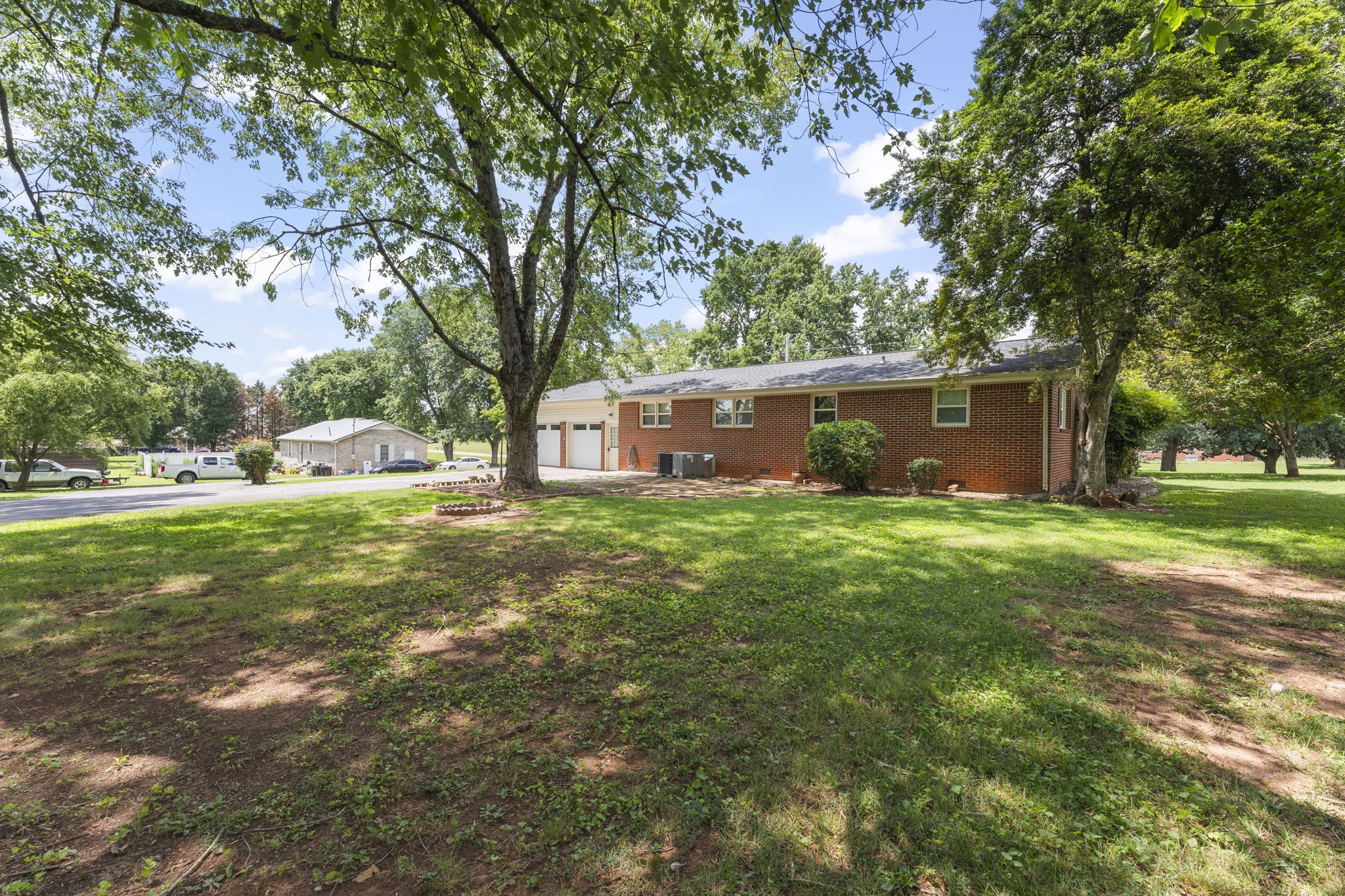 307 Mary Sharp Drive Decherd, TN 37324 - Photo 25 of 27 a view of a house with a yard and tree s