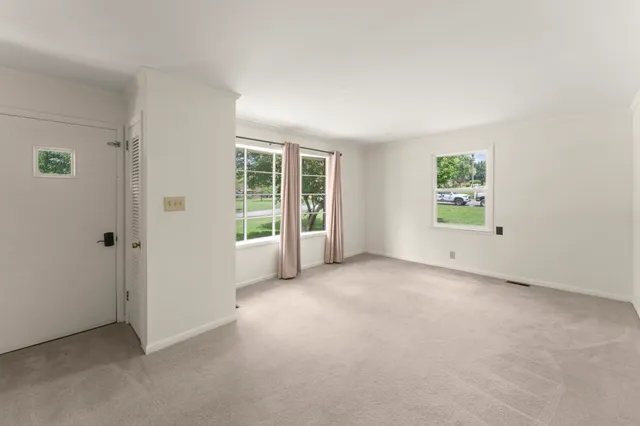 an empty room with windows