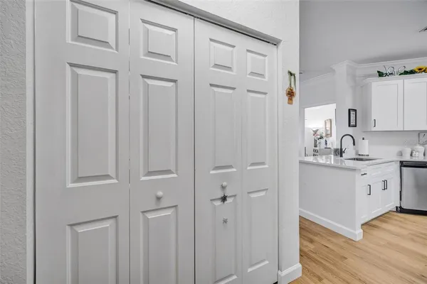 a view of a porch with a hanging chair