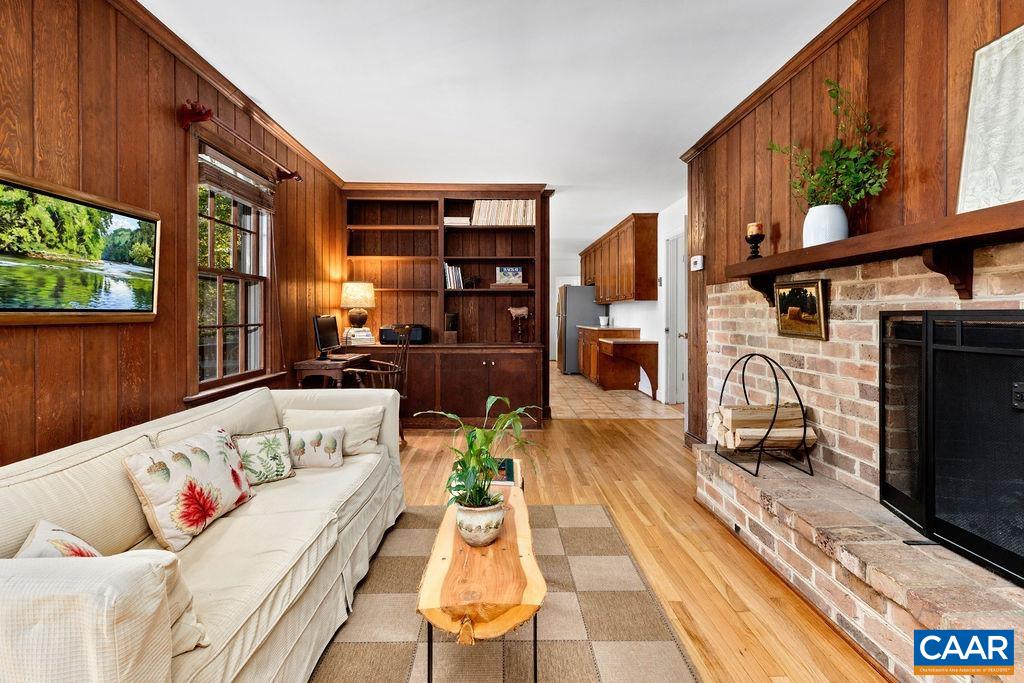 1730 Old Forge Road Charlottesville, VA 22901 - Photo 22 of 48 a living room with furniture fireplace and flat screen tv