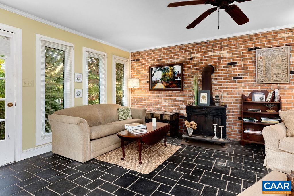 1730 Old Forge Road Charlottesville, VA 22901 - Photo 29 of 48 a living room with furniture and a rug
