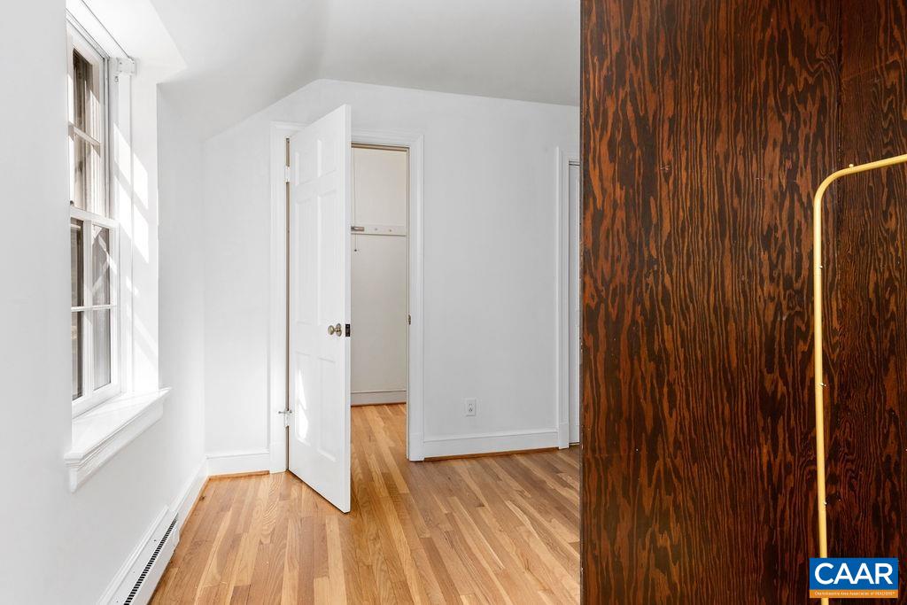 1730 Old Forge Road Charlottesville, VA 22901 - Photo 33 of 48 a view of a room with wooden floor and a window