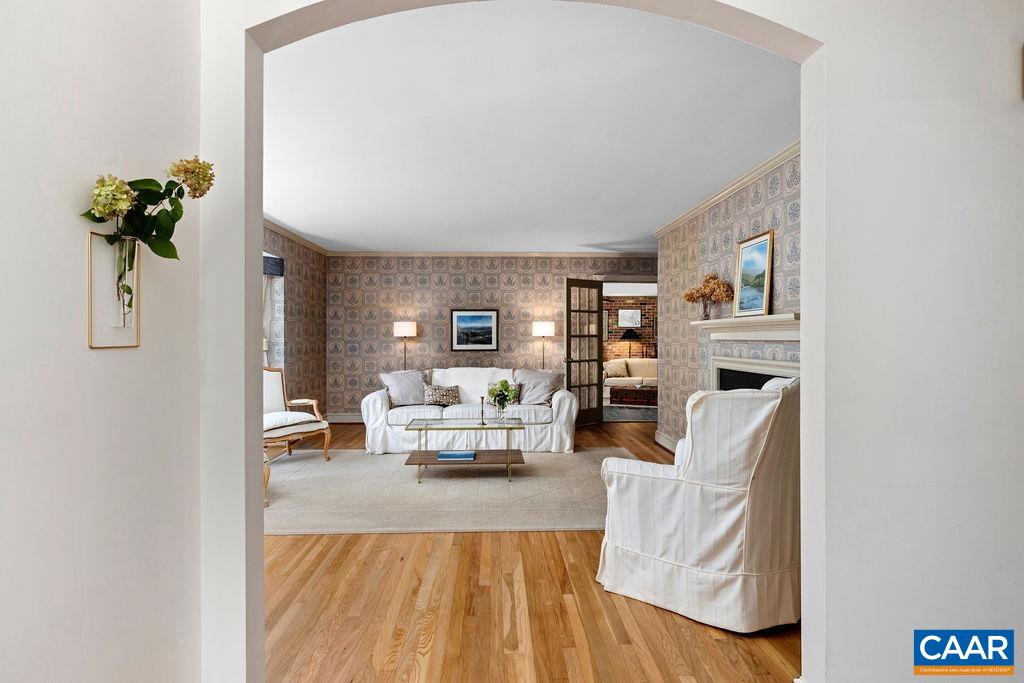 1730 Old Forge Road Charlottesville, VA 22901 - Photo 9 of 48 a living room with furniture and a potted plant