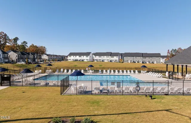 a view of a swimming pool and an ocean