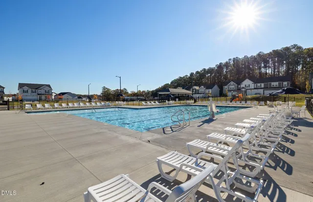 a view of swimming pool and lake