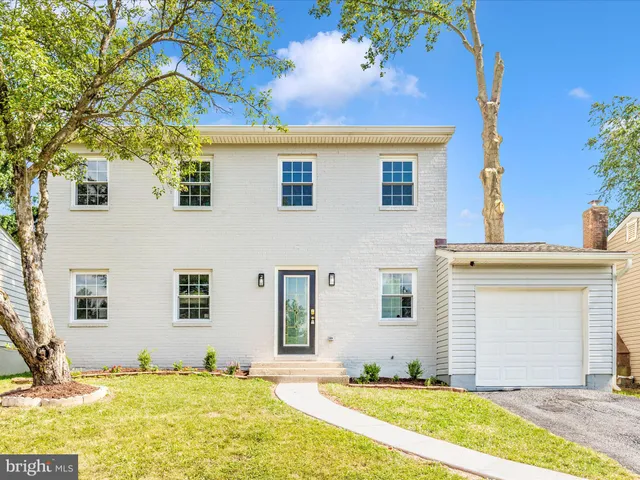 a view of a house with a swimming pool