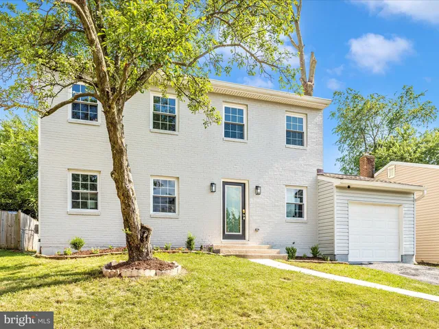 a view of a house with a swimming pool