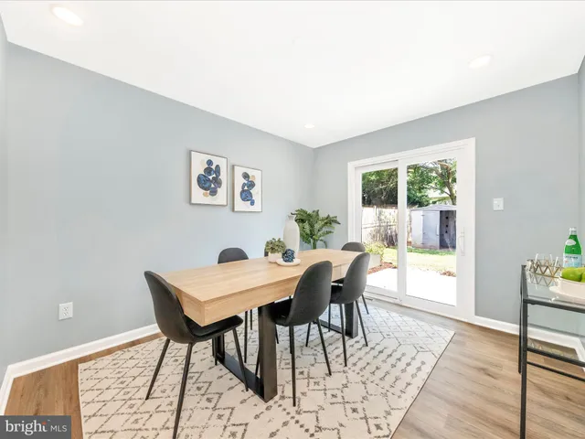 a view of a livingroom with furniture and wooden floor