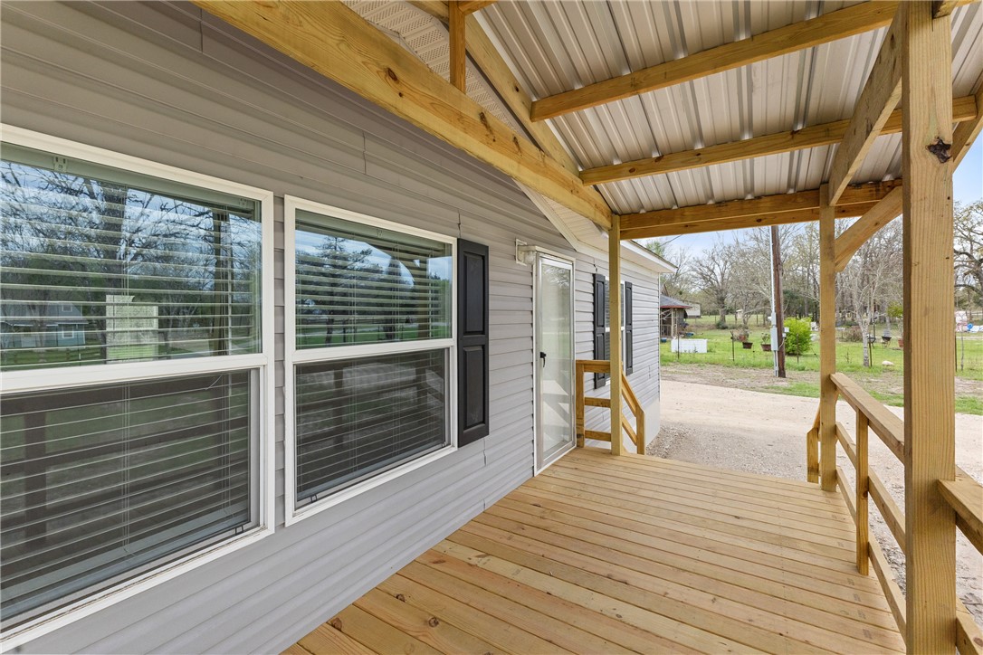 1014 Doe Run Road Caldwell, TX 77836 - Photo 6 of 23 a view of porch with wooden floor