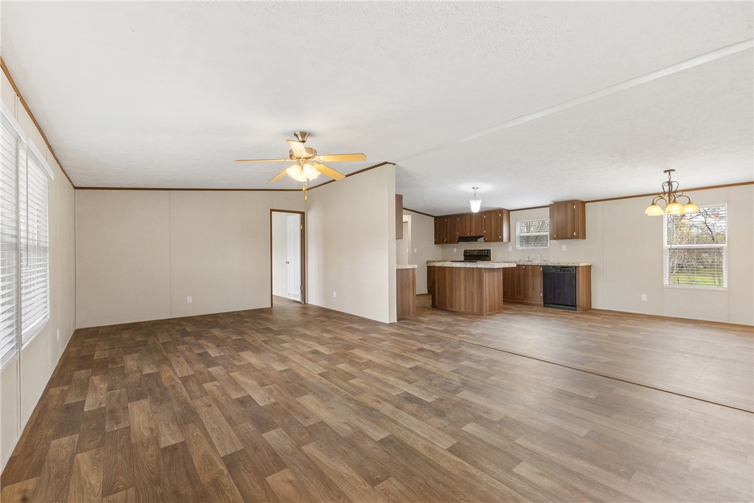 1014 Doe Run Road Caldwell, TX 77836 - Photo 7 of 23 a view of a kitchen with a sink and a refrigerator