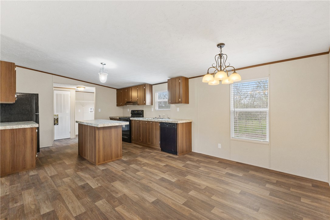 1014 Doe Run Road Caldwell, TX 77836 - Photo 9 of 23 a view of a kitchen with a sink and microwave