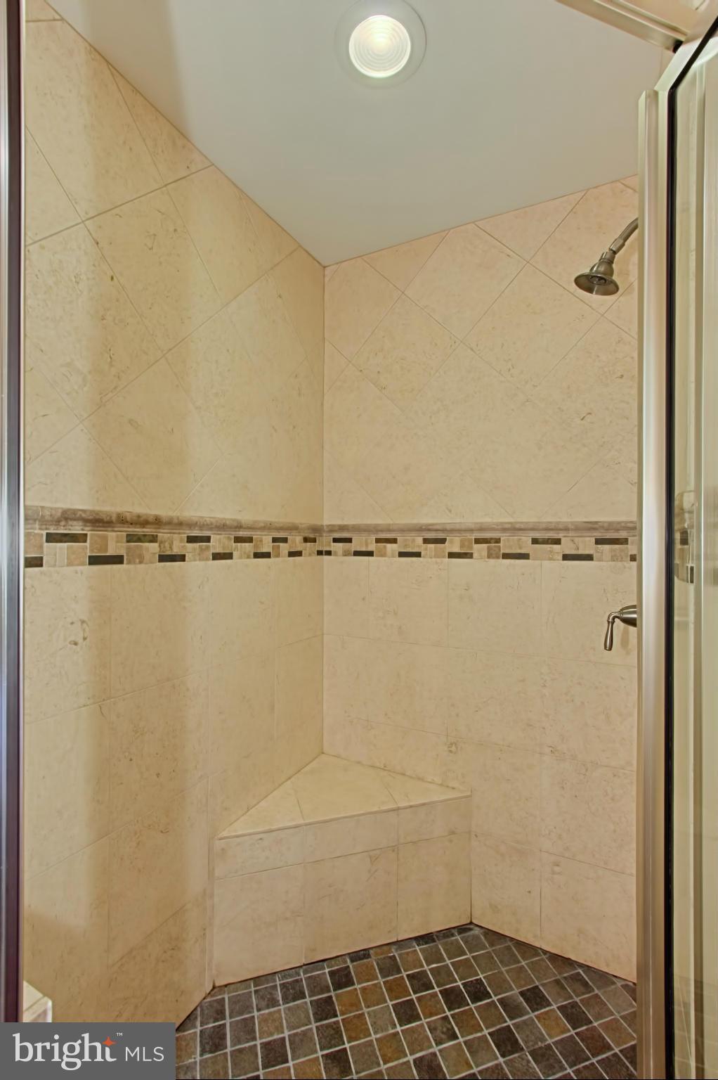 12207 Hounds Lane Reston, VA 20191 - Photo 17 of 30 Master Bath Shower w/ Stone Accents