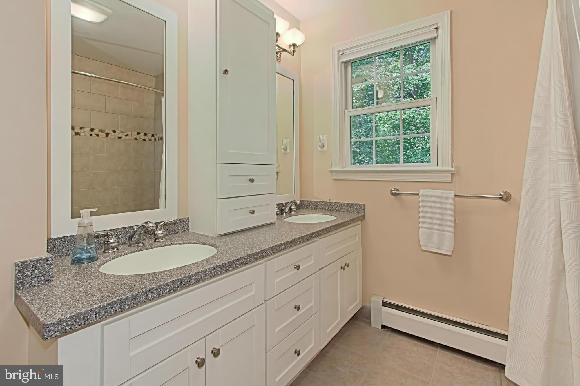 12207 Hounds Lane Reston, VA 20191 - Photo 21 of 30 Upper Hall Bath with Dual-Vanity