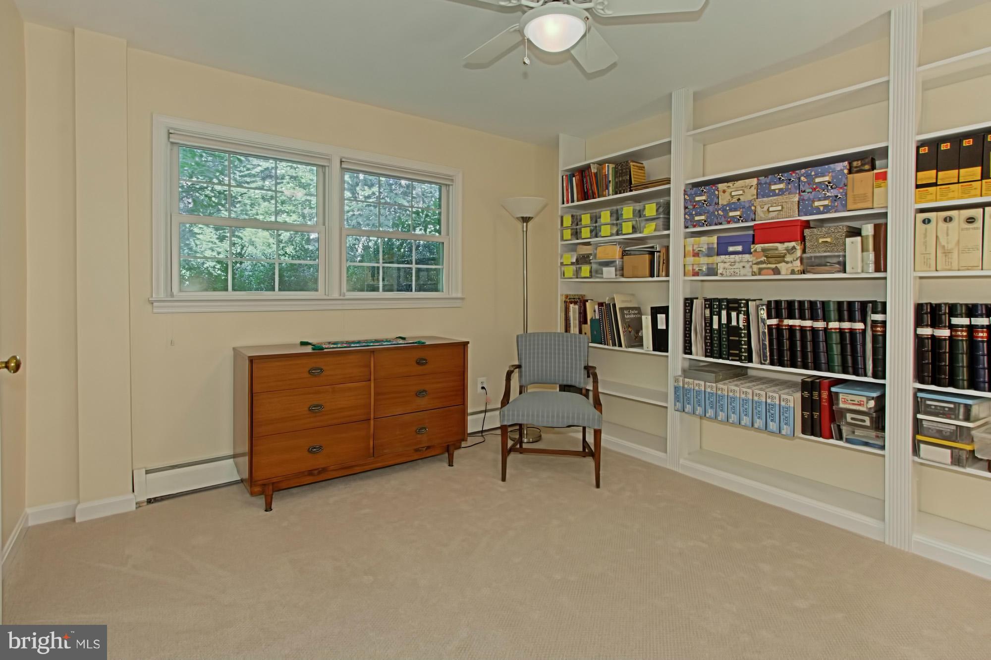 12207 Hounds Lane Reston, VA 20191 - Photo 22 of 30 5th Bedroom w/ Built-In Bookshelves