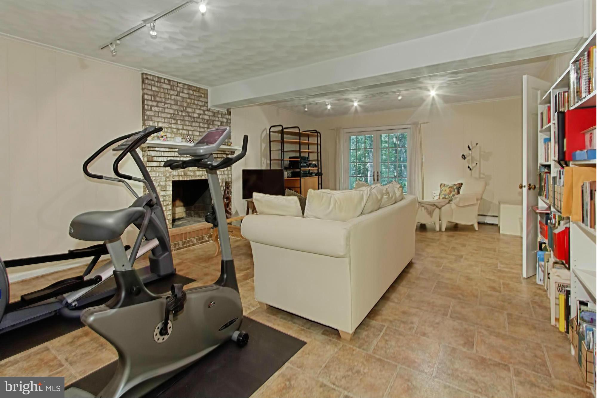 12207 Hounds Lane Reston, VA 20191 - Photo 24 of 30 Basement French Doors Open to the Private Patio