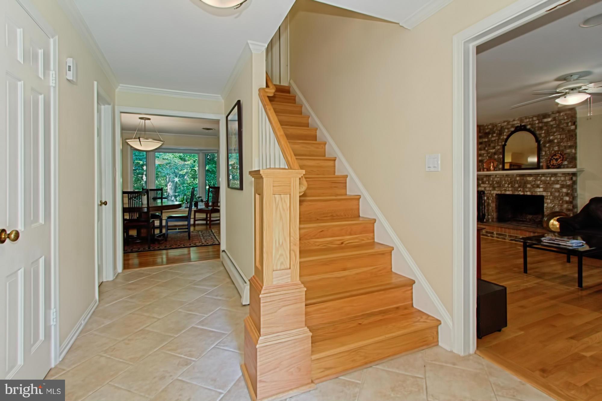 12207 Hounds Lane Reston, VA 20191 - Photo 4 of 30 Welcoming Entryway w/ Upgraded Wood Staircase