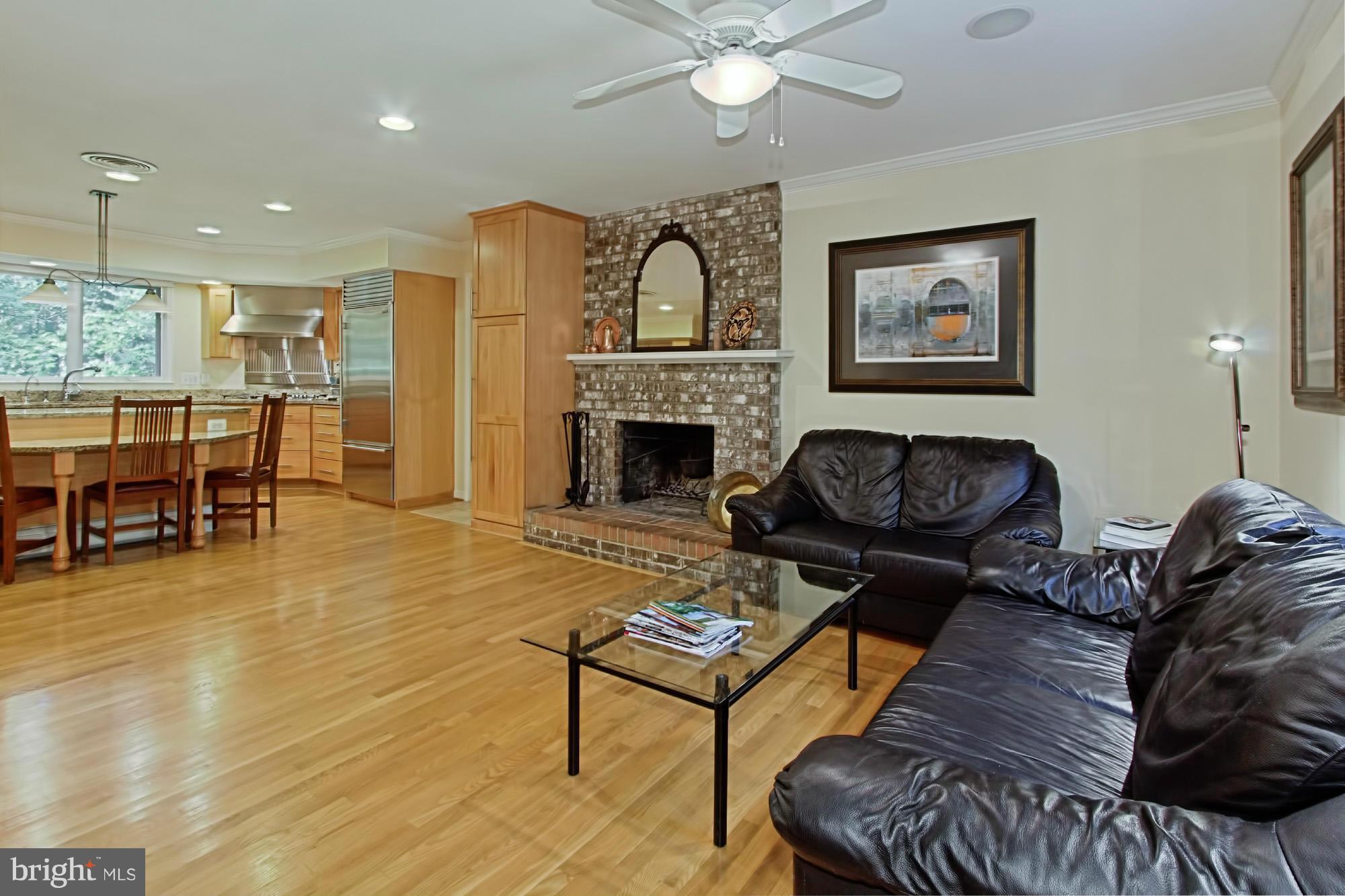 12207 Hounds Lane Reston, VA 20191 - Photo 6 of 30 Comfortable Living Room Opens to the Kitchen