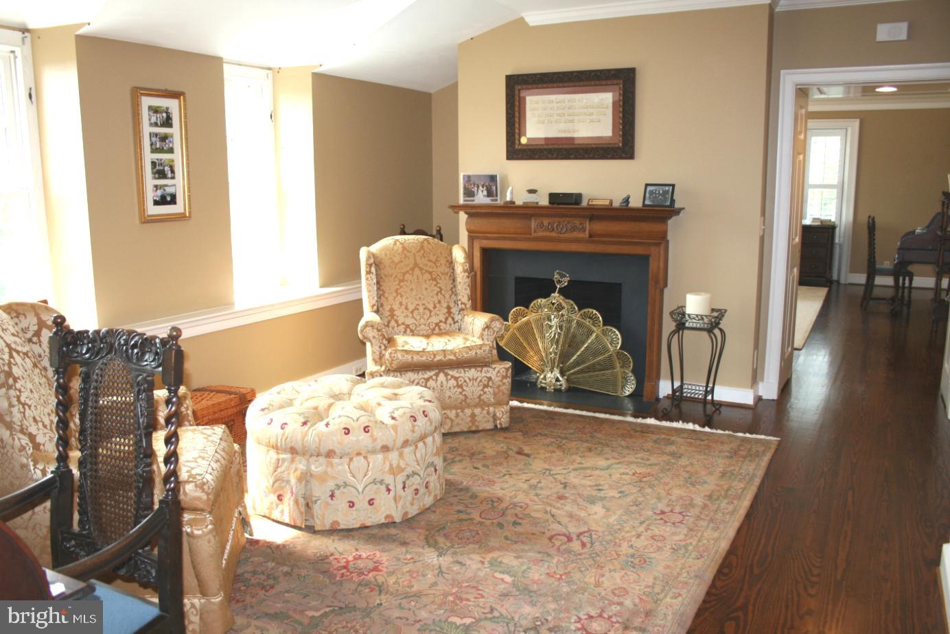 36987 Mountville Road Middleburg, VA 20117 - Photo 8 of 18 a living room with furniture and a fireplace