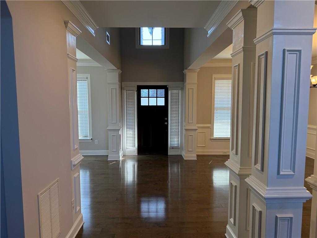 5670 Bridleton Crossing Suwanee, GA 30024 - Photo 2 of 23 a view of gallery with wooden floor