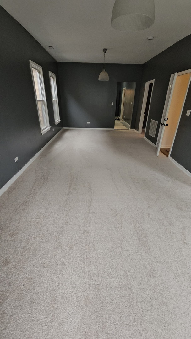 663 West 117th Place, Unit 2 Chicago, IL 60628 - Photo 3 of 6 a view of an empty room