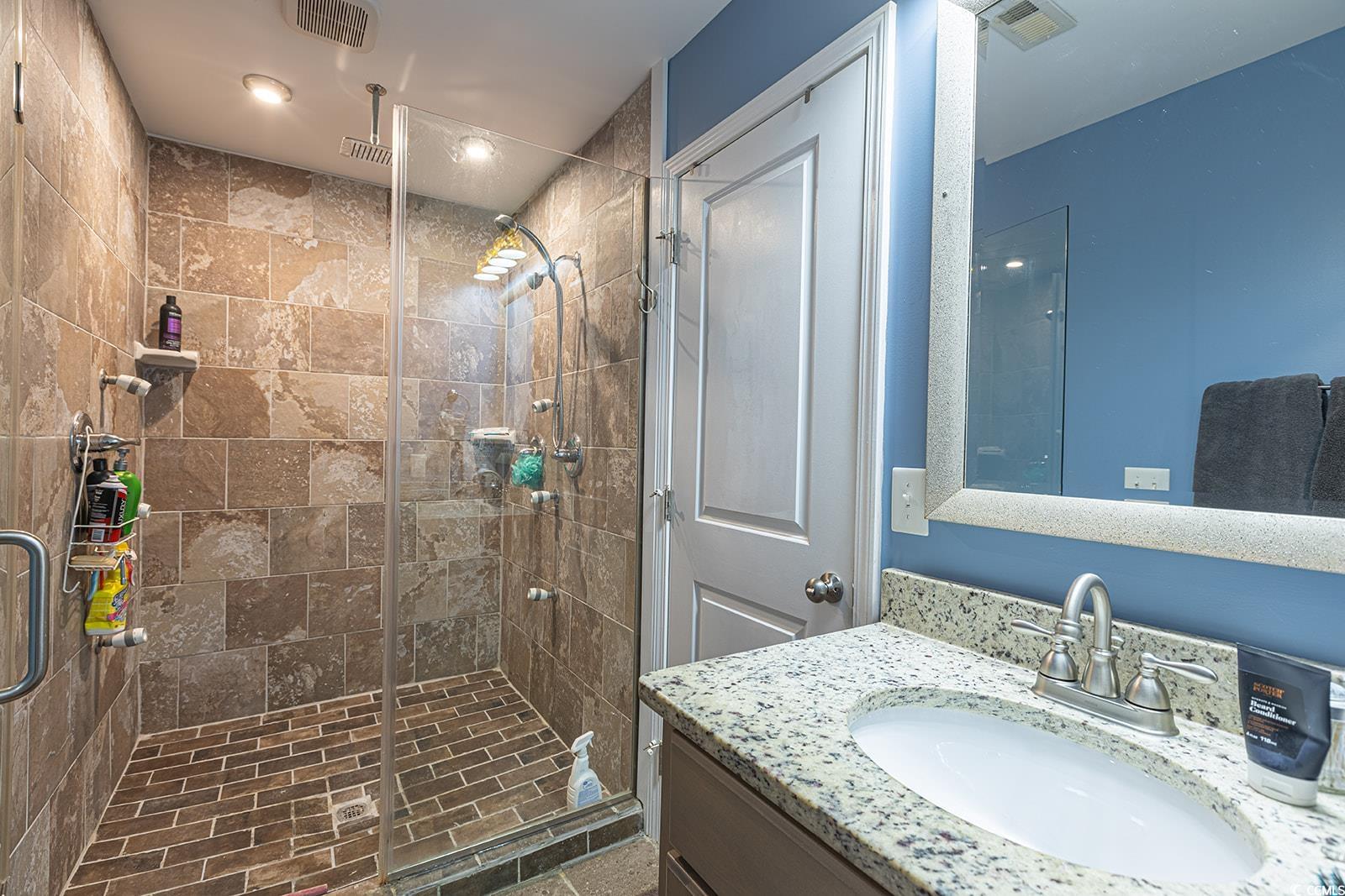 189 Hamilton Way Conway, SC 29526 - Photo 19 of 40 Bathroom with walk in shower and vanity