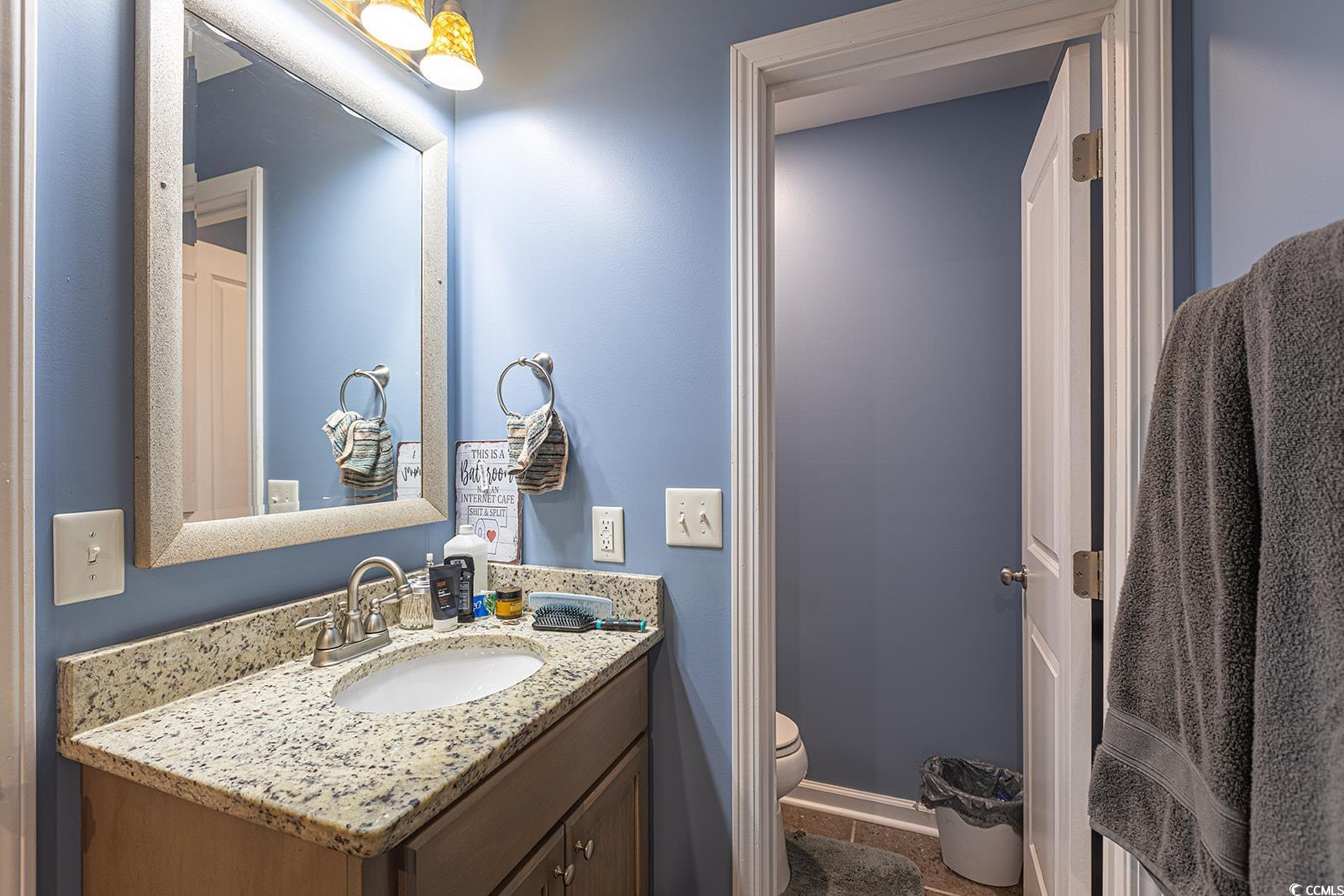 189 Hamilton Way Conway, SC 29526 - Photo 21 of 40 Bathroom with tile patterned floors, vanity, and t