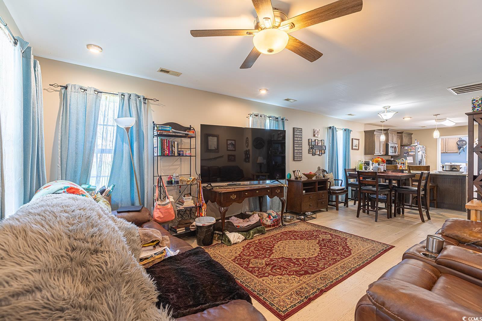 189 Hamilton Way Conway, SC 29526 - Photo 7 of 40 Tiled living room with ceiling fan