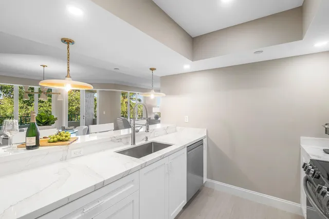 a bathroom with a bathtub a shower a sink and a mirror