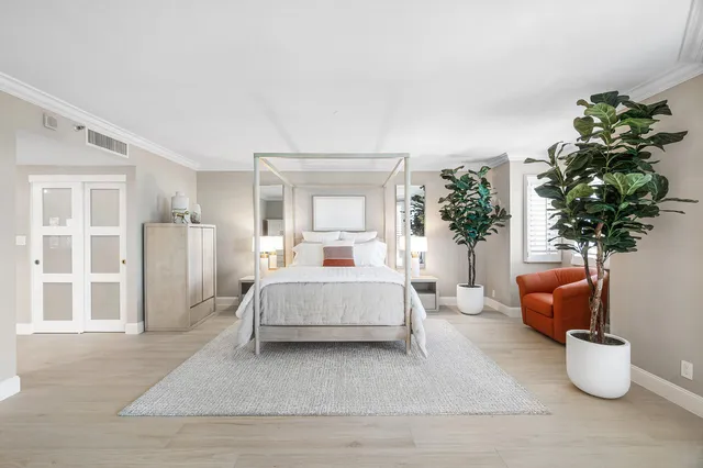 a bathroom with a sink double vanity and a mirror