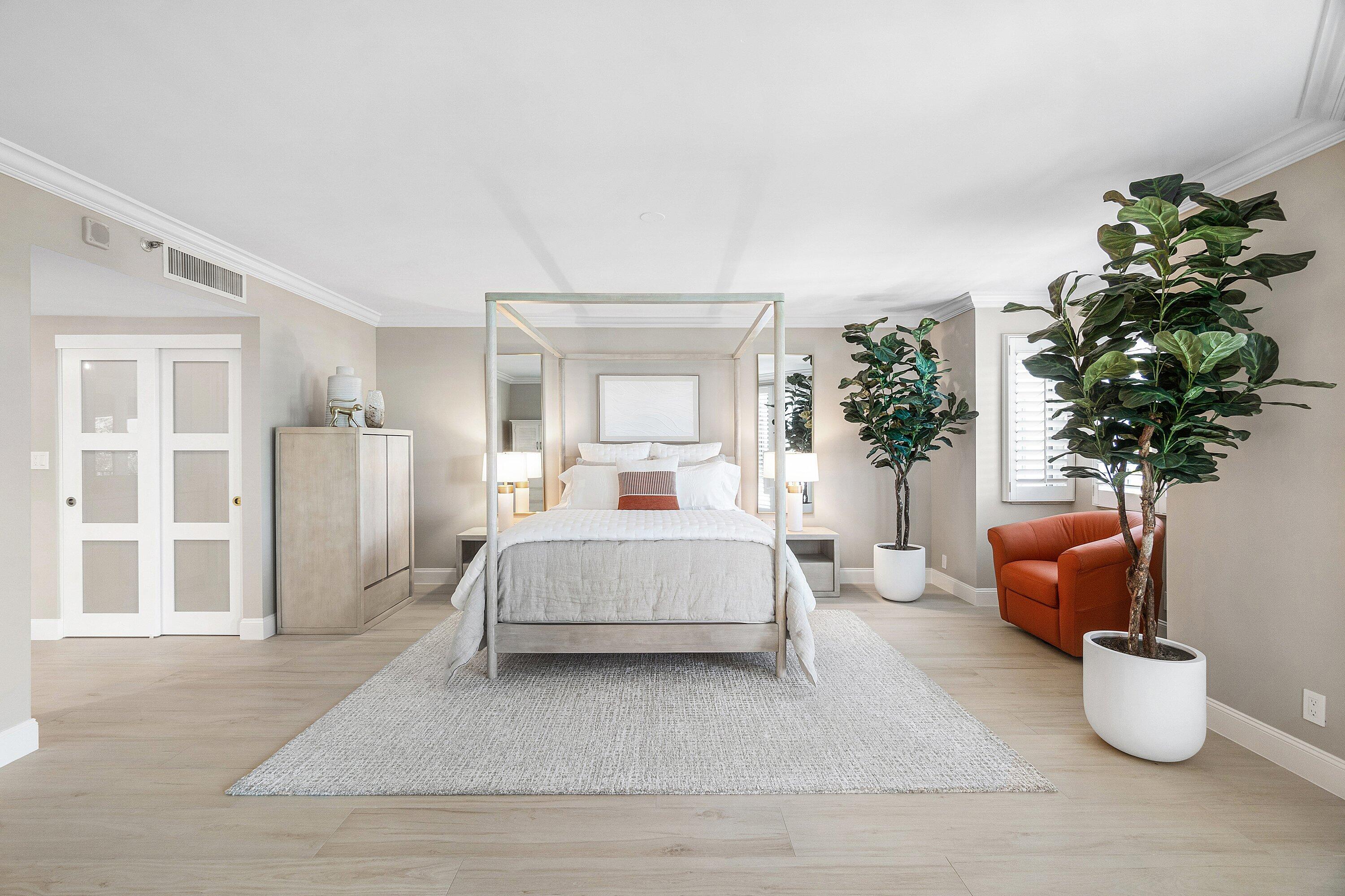 100 Southeast 5th Avenue, Unit 404 Boca Raton, FL 33432 - Photo 19 of 46 a living room with furniture and potted plant