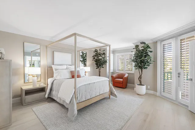 a bathroom with a double vanity sink mirror and shower