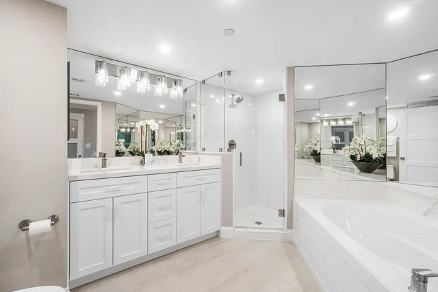 a view of a chairs and table in the balcony