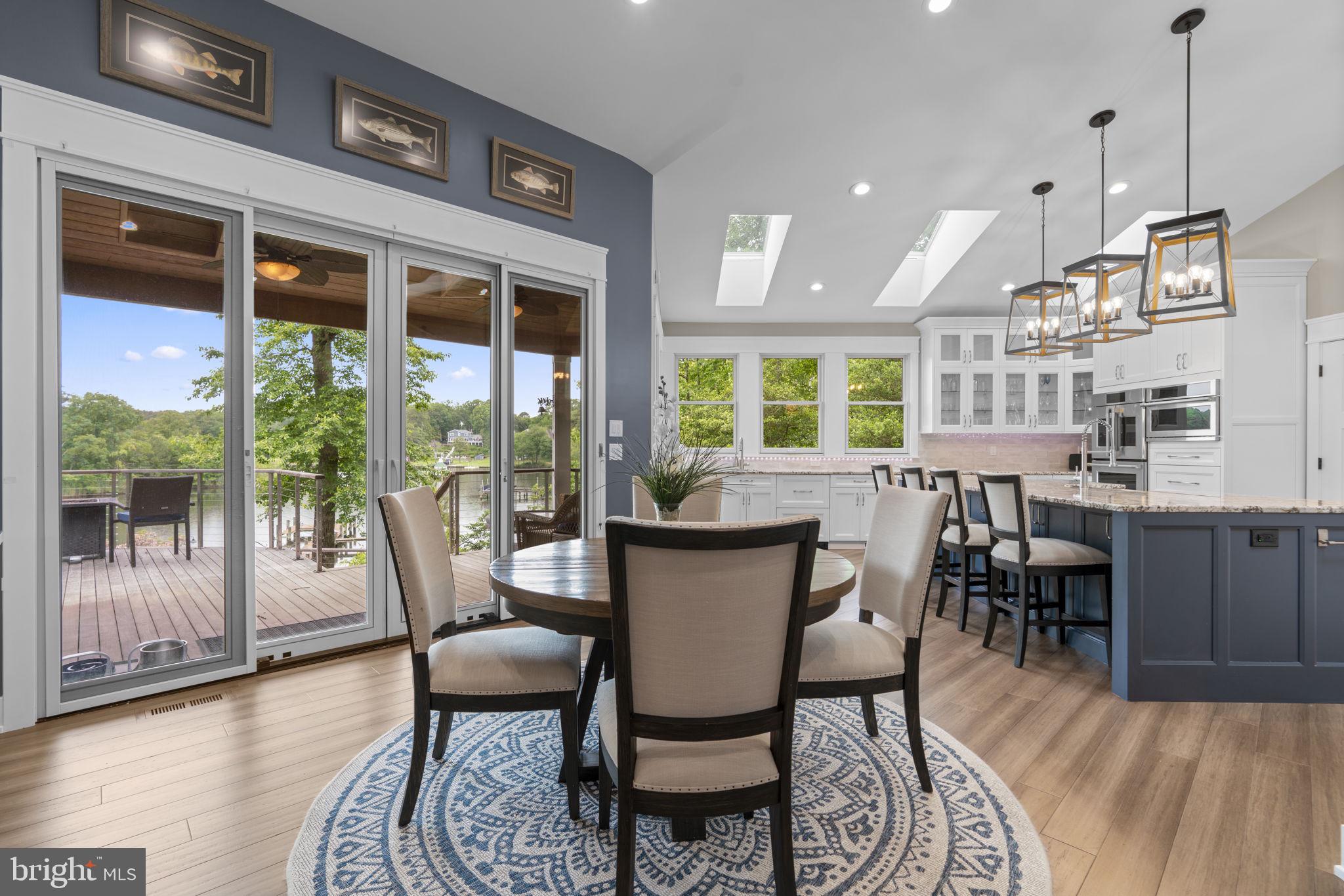 798 Creek View Road Severna Park, MD 21146 - Photo 13 of 72 a dining room with furniture window and wooden floor