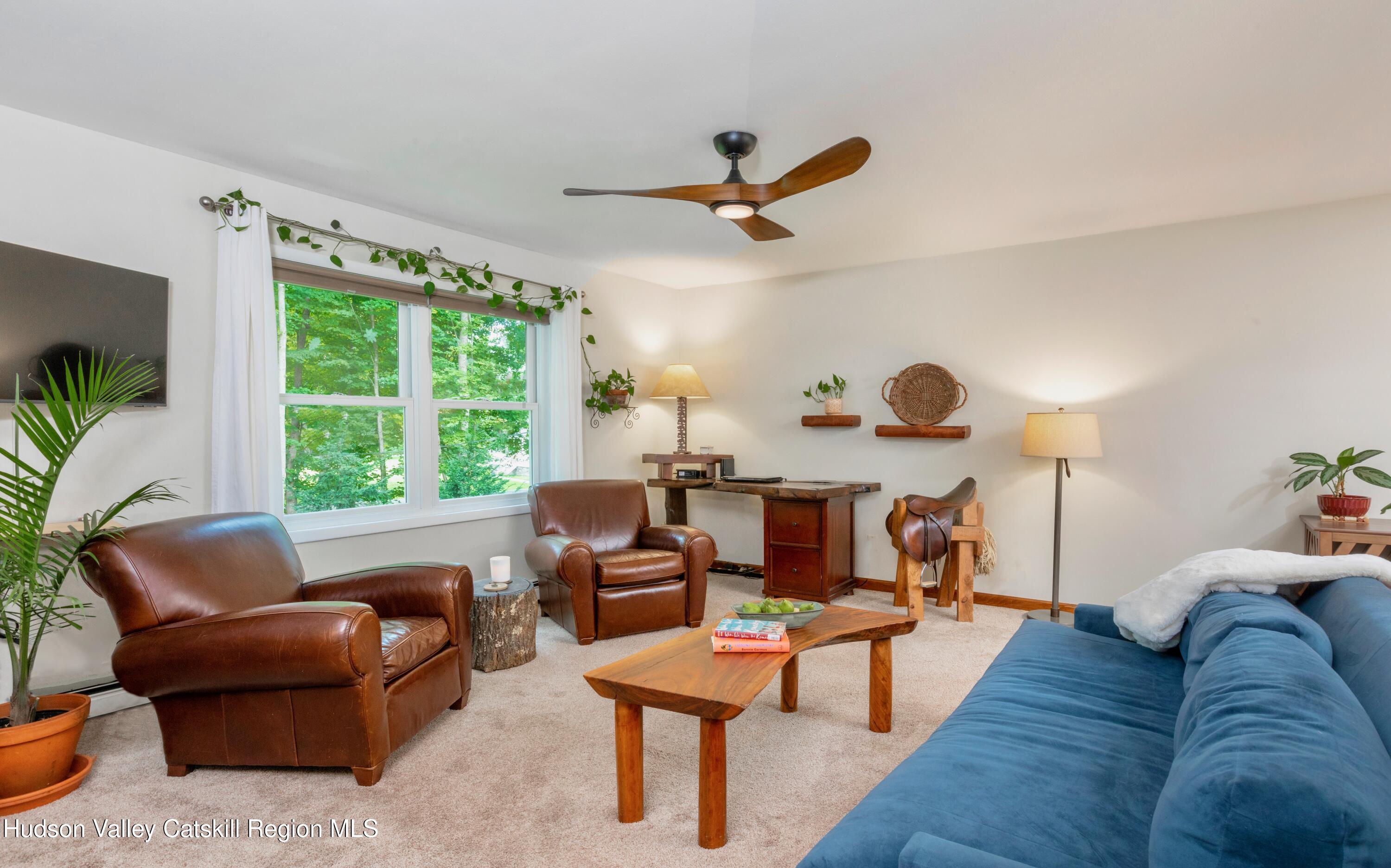 424 Tongore Way Kingston, NY 12401 - Photo 12 of 40 a living room with furniture and a window