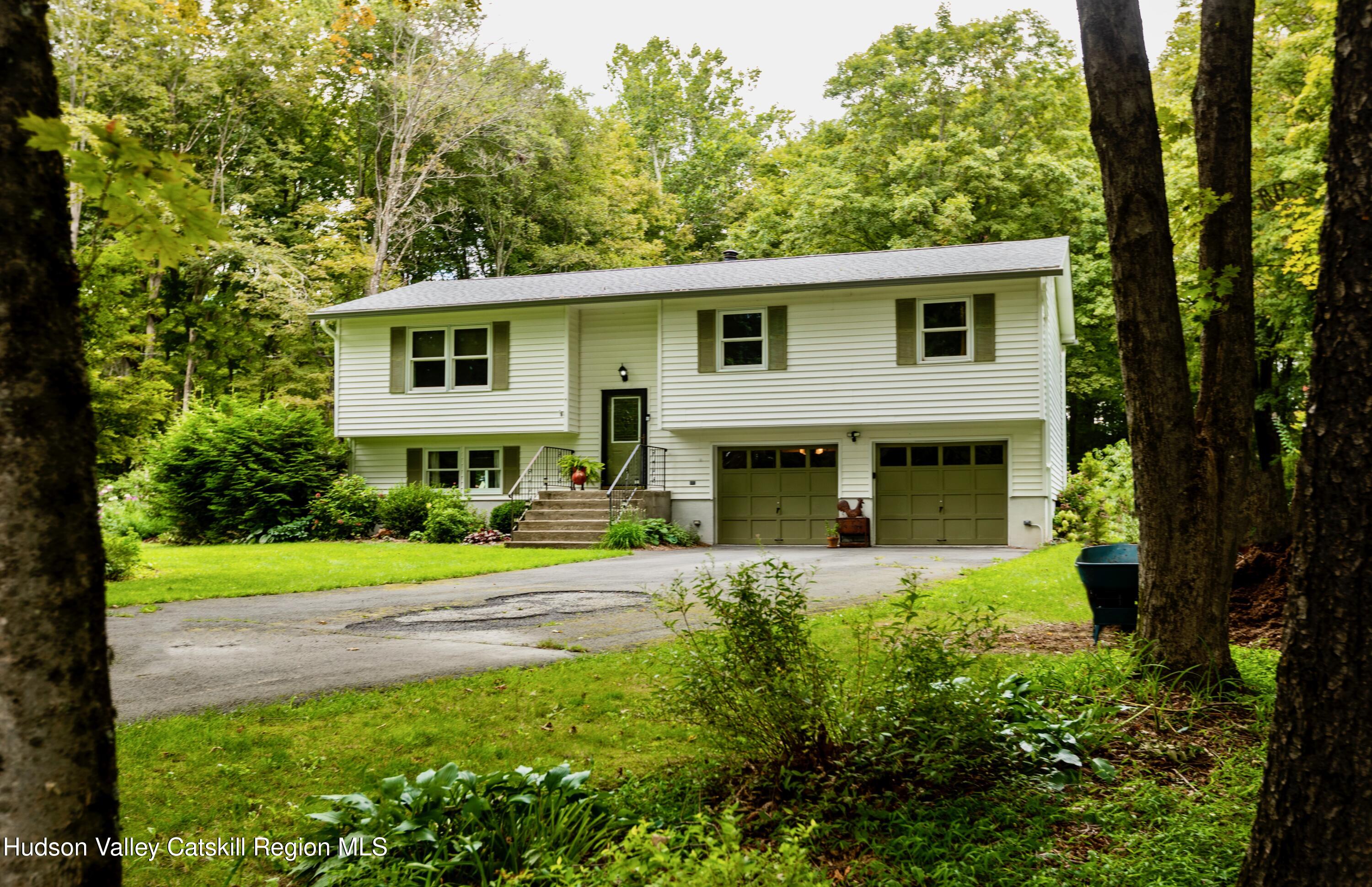 424 Tongore Way Kingston, NY 12401 - Photo 40 of 40 a front view of a house with garden