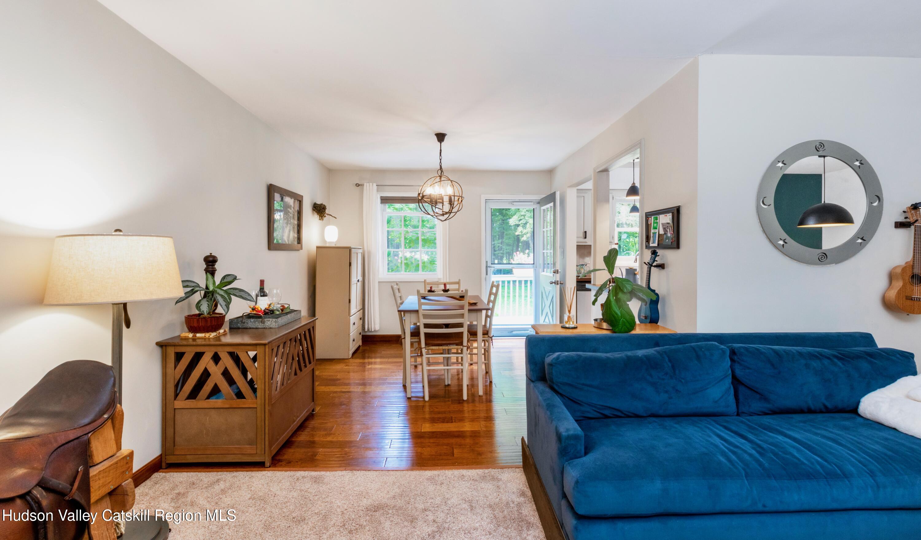 424 Tongore Way Kingston, NY 12401 - Photo 4 of 40 a living room with furniture and wooden floor