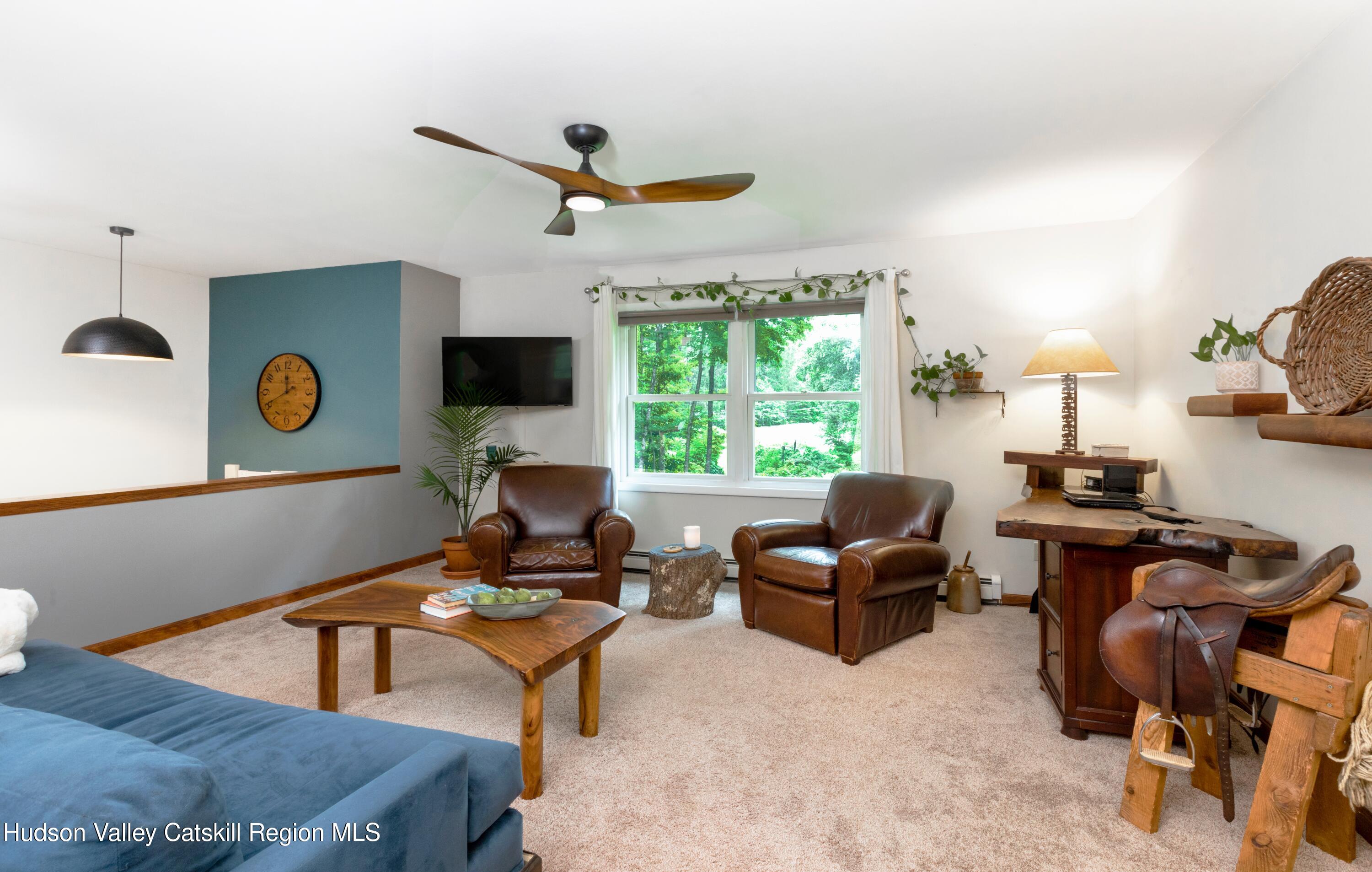 424 Tongore Way Kingston, NY 12401 - Photo 10 of 40 a living room with furniture and a window