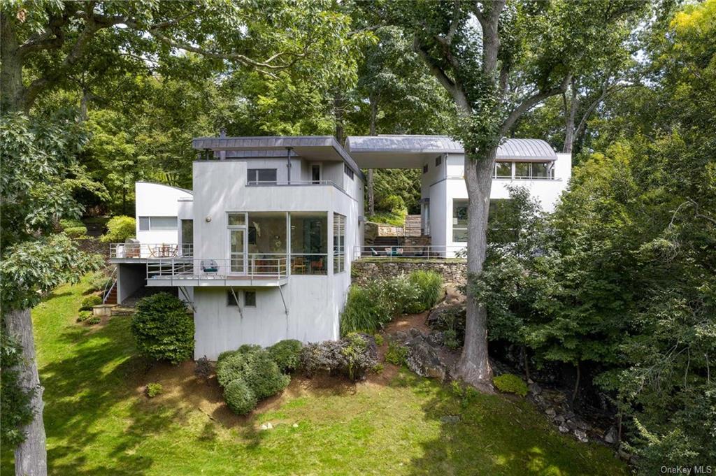 front view of a house with a small yard