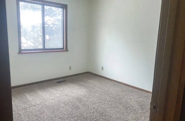 an empty room with a window