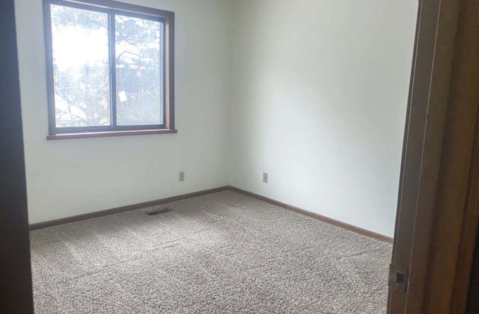 418 Cadillac Street Ligonier, IN 46767 - Photo 11 of 15 an empty room with a window