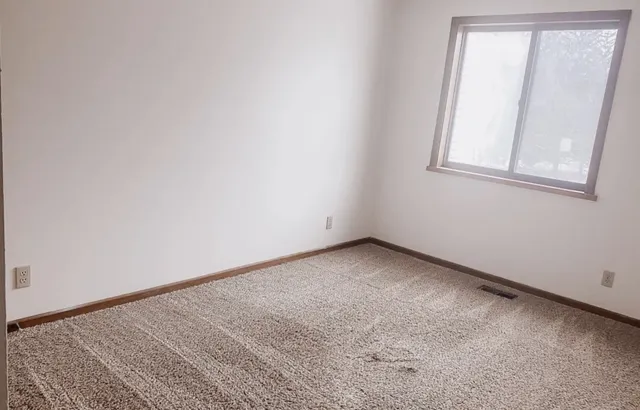 an empty room with a window