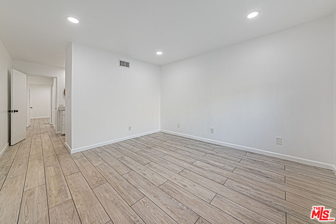 1941 Pine Drive La Habra, CA 90631 - Photo 16 of 35 a view of empty room with wooden floor